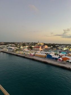 Caribbean coastal port town with colorful buildings and harbor